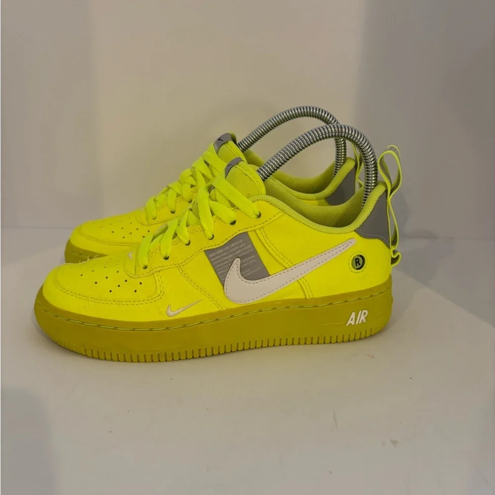 Nike Low-Top Sneakers in Neon Yellow with White Swoosh size 4